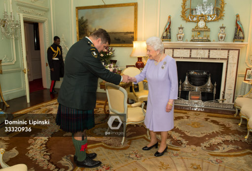 Queen Elizabeth II meets Lieutenant Colonel Harry Pedwell of the 48th Highlanders of Canada during a private audience at Buckingham Palace, London, in her capacity as