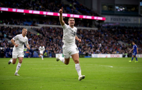 Burnley's Sam Vokes celebrates scoring his side's second goal of the game during the Premier League match at the Cardiff City Stadium.