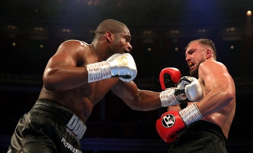 Daniel Dubois (left) and Razvan Cojanu during the Vacant WBO European Championship bout at the Royal Albert Hall, London.