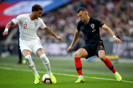Croatia's Ivan Perisic (right) and England's Kyle Walker (left) battle for the ball during the UEFA Nations League, Group A4 match at Wembley Stadium, London.