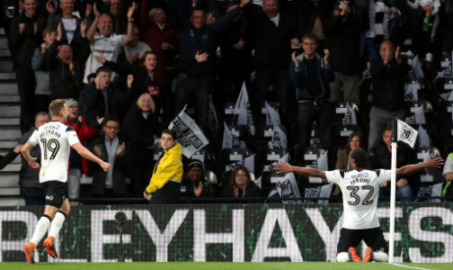 Derby County's Cameron Jerome (right) celebrates scoring his side's first goal of the game during the Sky Bet Championship Playoff match at Pride Park, Derby.